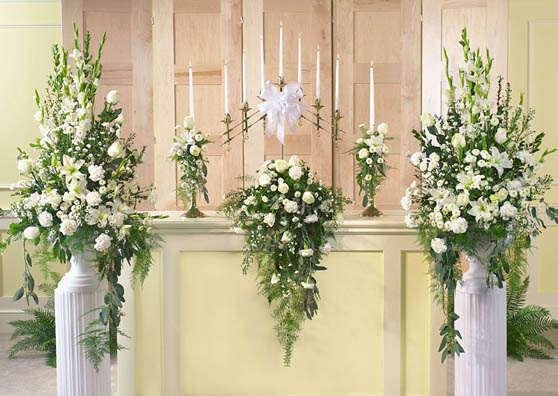 Wedding flowers at the alter